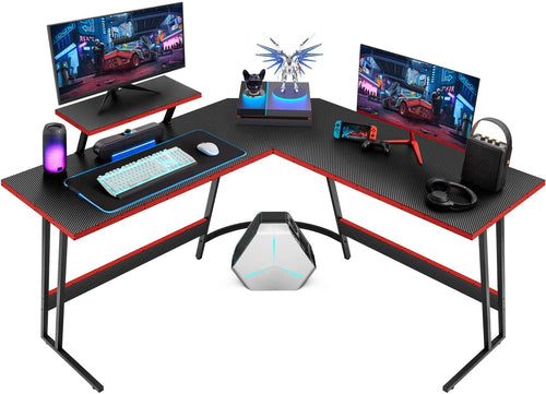 L shaped gaming desk with dual monitors, RGB lights, keyboard, and gaming accessories for an immersive gaming setup.